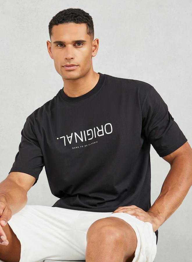 Styli Cotton Rich Oversized Original Upside Down Text Print T-Shirt - Image 1